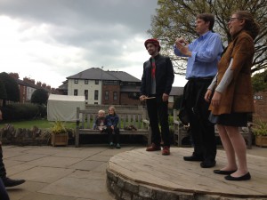 Griffin, Professor Pickett, and Sydney participating in a Shakespeare Aloud demonstration 
