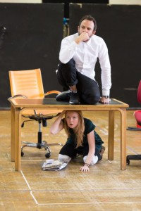 Susan hitting her head on the table upon hearing about her potential marriage to Clarke. 